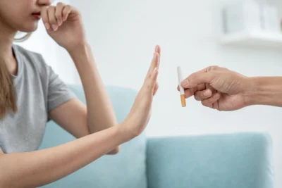 woman refusing cigarette