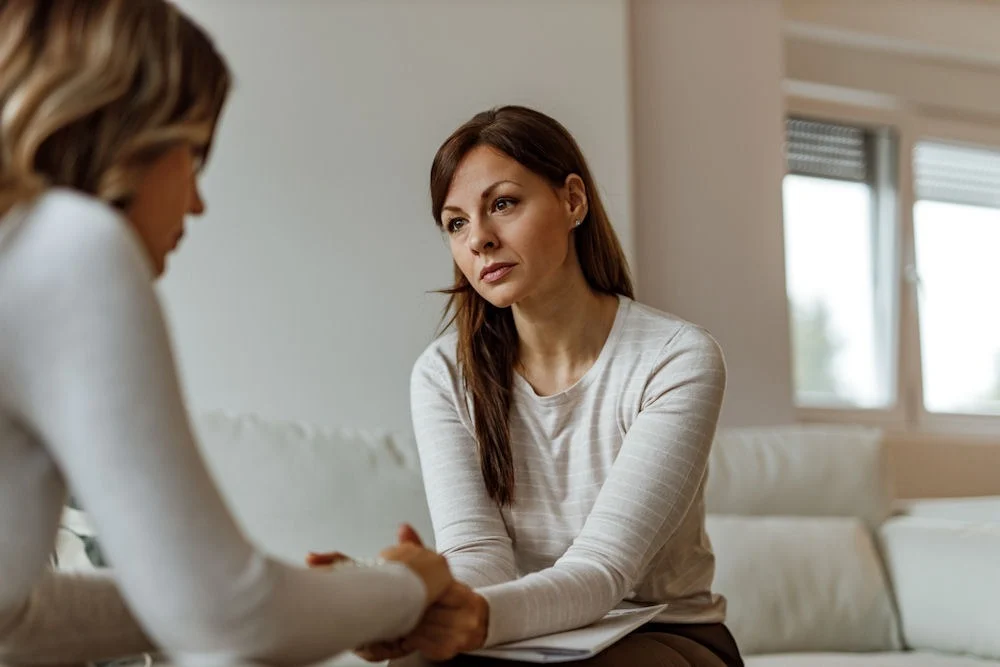living-with-high-functioning-depression a woman being comforted in therapy