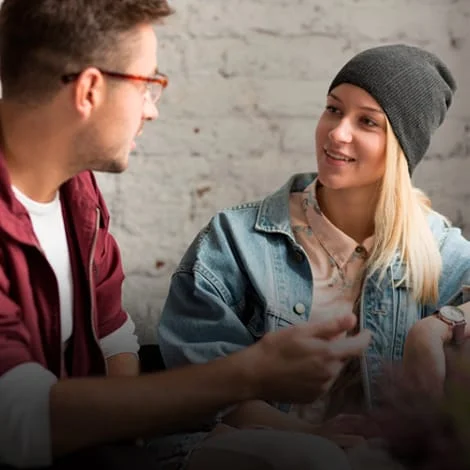 music-threrapy-in-los-angeles A young man and woman engage in a relaxed session during music therapy in Los Angeles