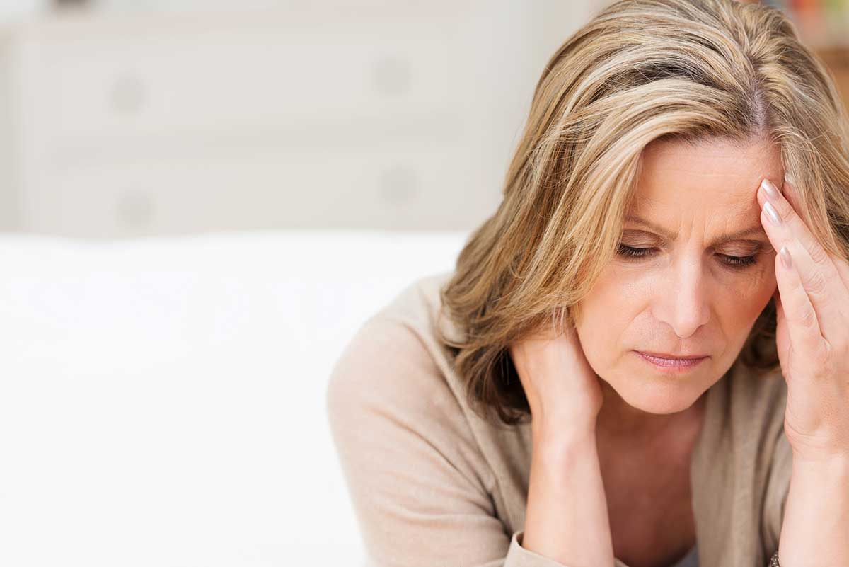 woman thinking about addiction recovery stress