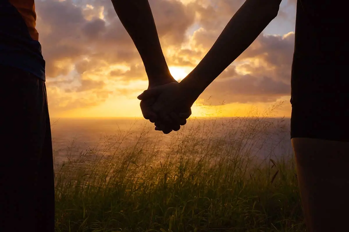 couple holding hands and dating after addiction