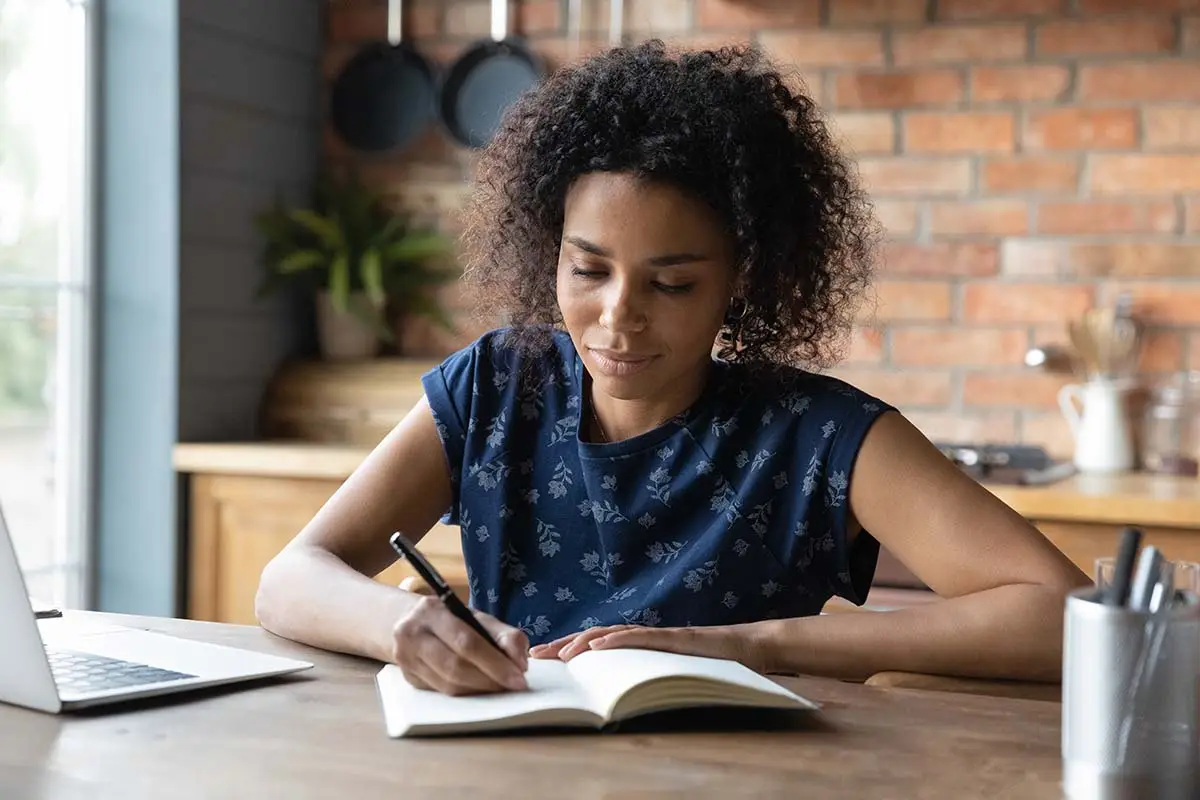 a woman creating an addiction recovery plan