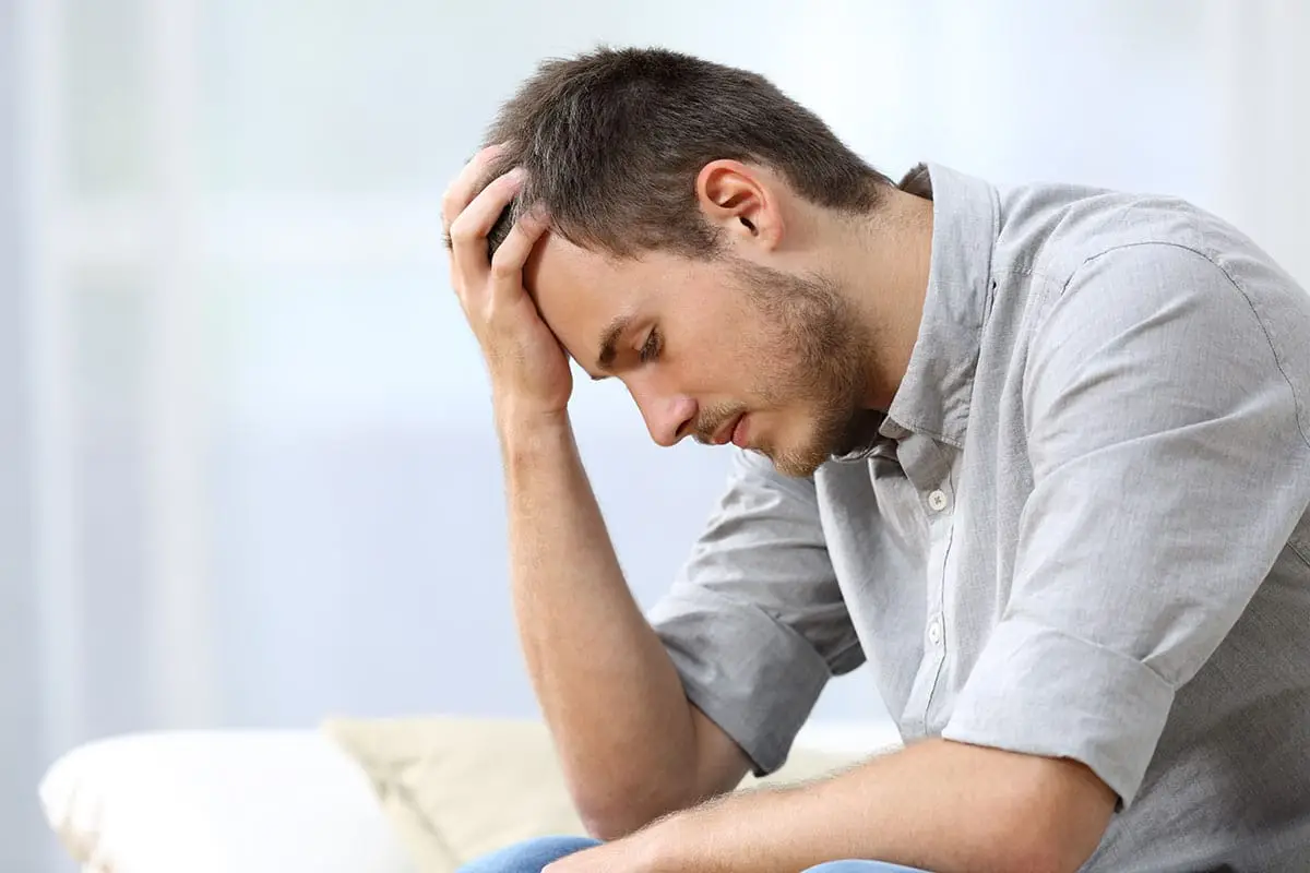 a man thinking about the myths of relapse