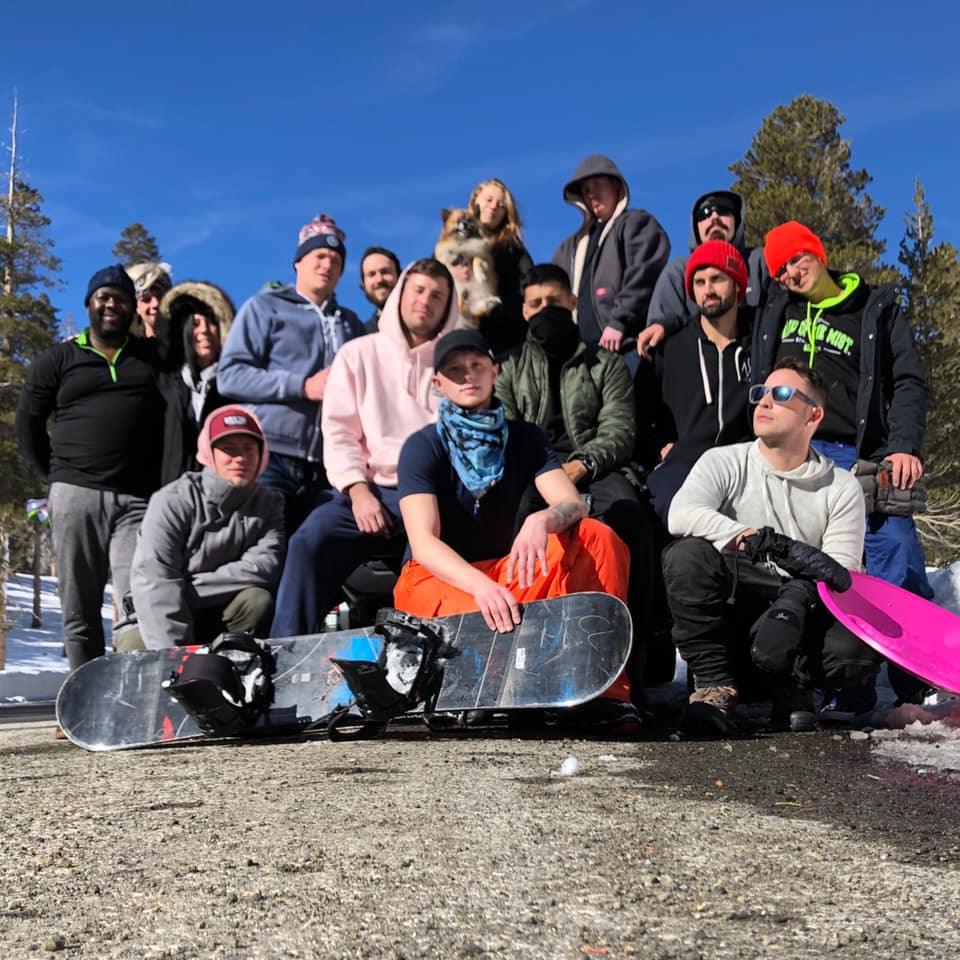 adventure therapy program group ready to snowboard