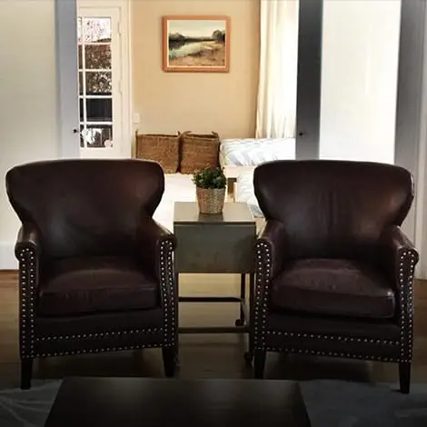 Laurel-Canyon-House-Gallery-7 two leather chairs at Laurel Canyon House