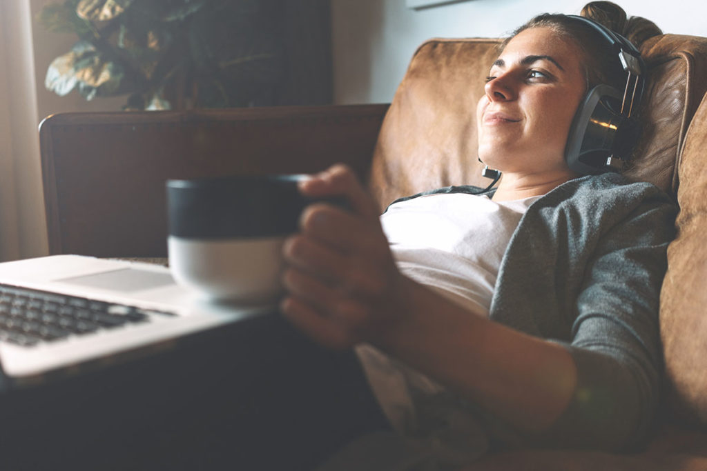 a woman enjoys music therapy for addiction