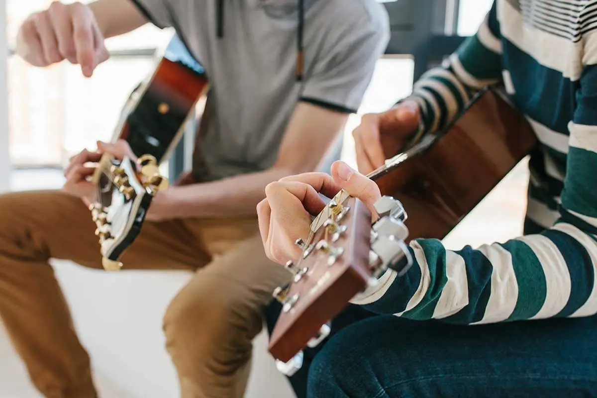 two people participate in a music therapy program