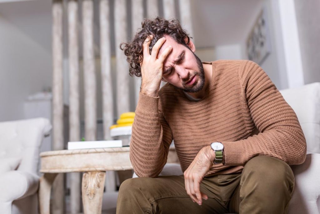 man struggles with chronic pain and addiction