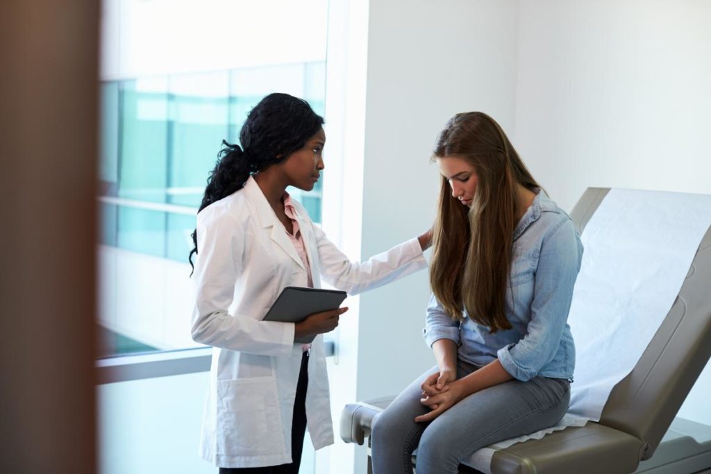 woman begins tms therapy for depression