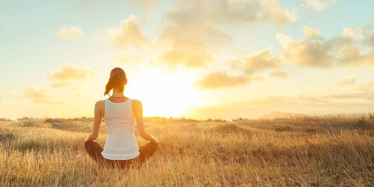 a woman considers reducing anxiety through meditation by practicing meditation for anxiety