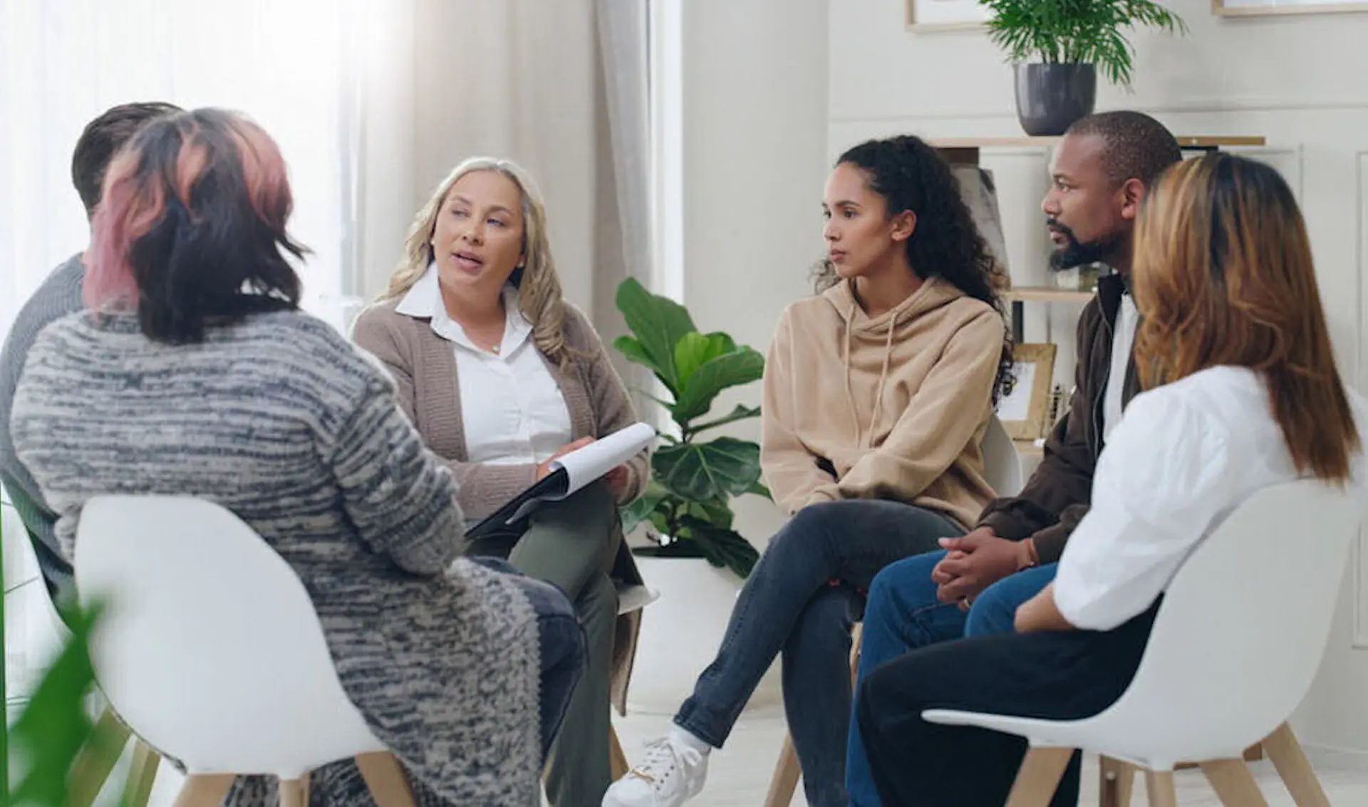 diverse group joins supportive DBT session for addiction recovery in Los angeles