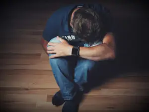 man questioning whether he has a gambling addiction and seeking guidance