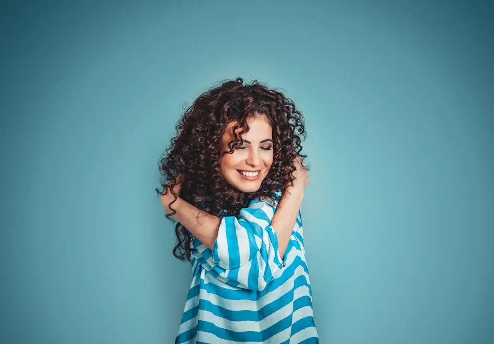 girl practicing self-love and positive affirmations in recovery