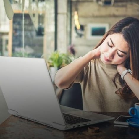 chronic-pain-treatment-center woman appearing to struggle with neck pain and fatigue needing chronic pain at depression treatment center