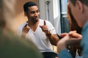 man using insurance for rehab during group session in Los Angeles