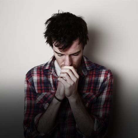 man with psychological trauma waiting for substance abuse treatment programs