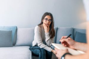 Therapy session in young adult drug rehab program