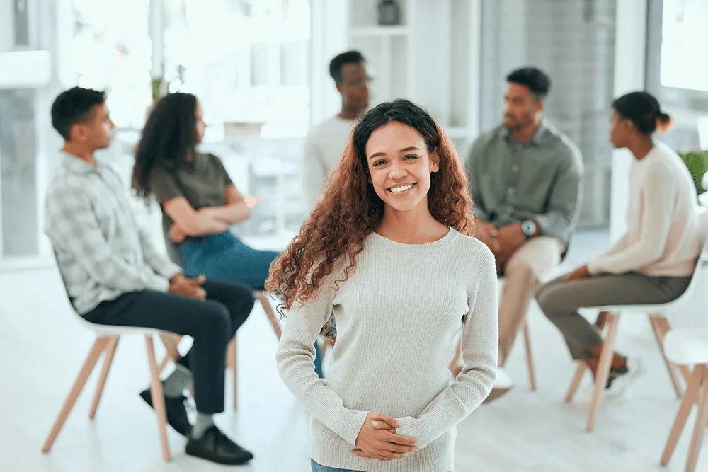 group of people participating in an acceptance and commitment therapy session