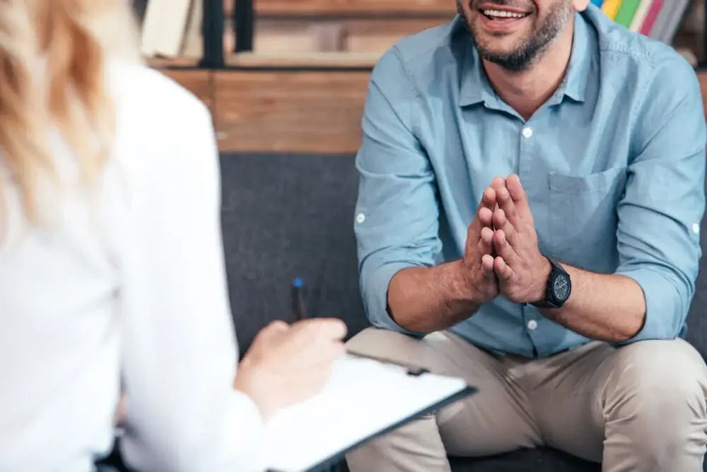 image showing therapist and patient using CBT for addiction treatment