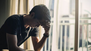 man learning strategies to overcome gambling addiction and regain control
