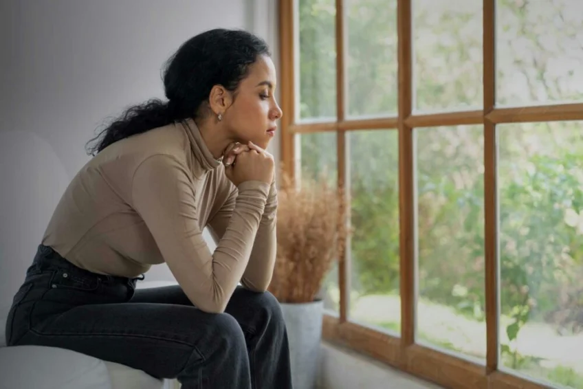 girl struggling with bipolar disorder seeking support and treatment
